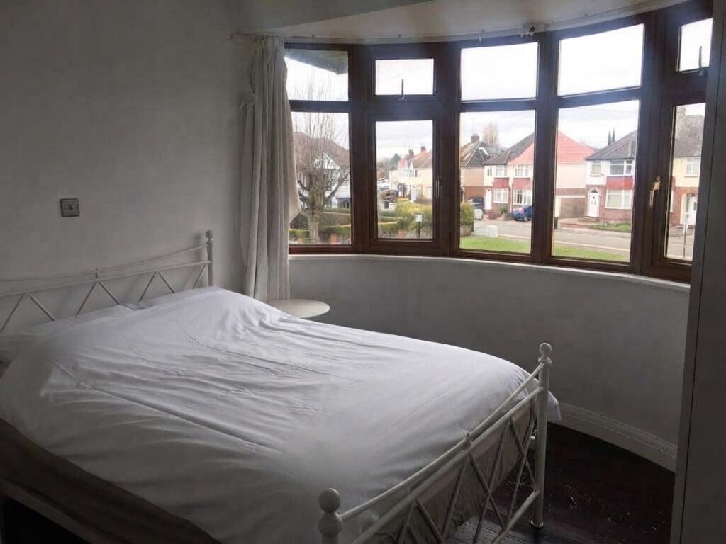 House in Coventry, Cheylesmore shopping parade, Cheylesmore - More