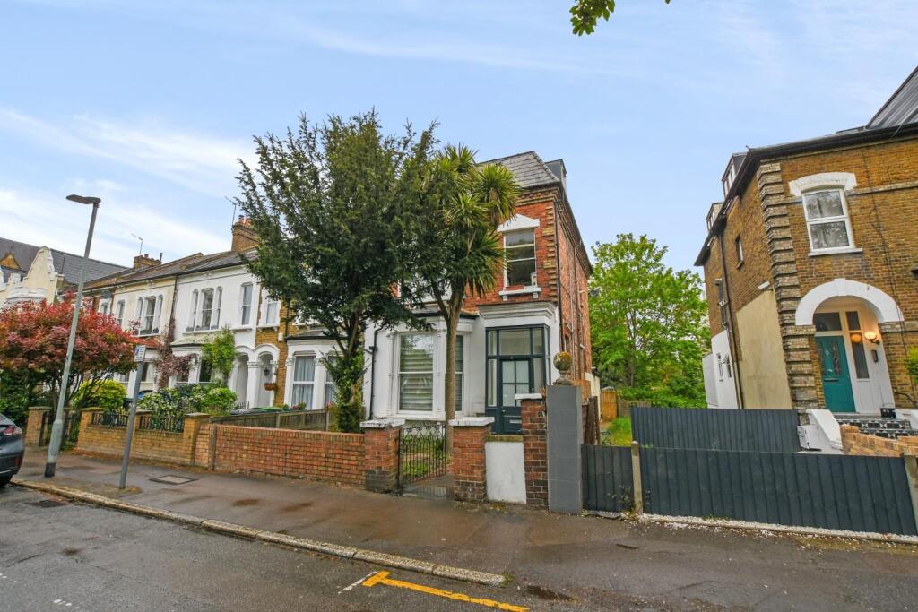 Main image of property: Freehold with rear garden land