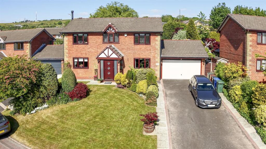 Main image of property: Ridgeways, Haslingden, Rossendale - Superbly presented family living, excellent gardens, ample parking provision