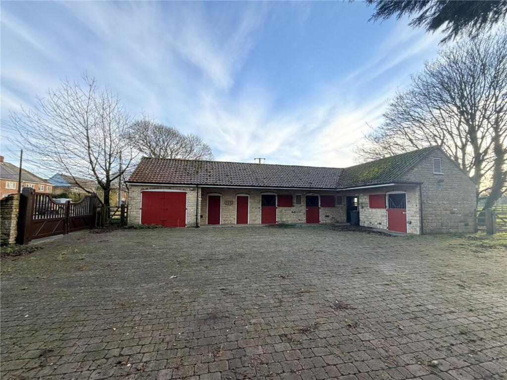Main image of property: TO LET, Land & Stables, Vicarage Lane, Harmston, LN5