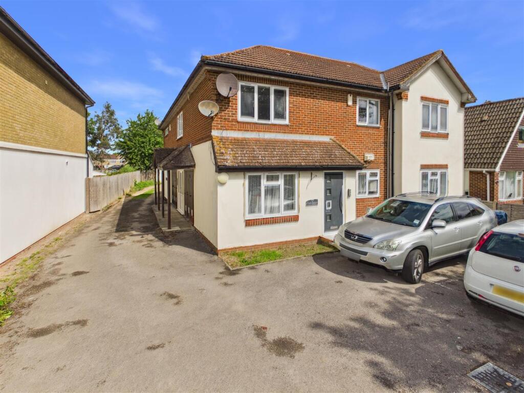 Main image of property: Field Common Lane, Walton-On-Thames