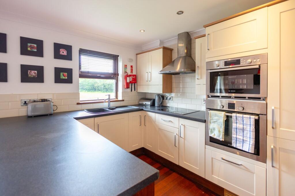 Kitchen inside a Parc Teifi home