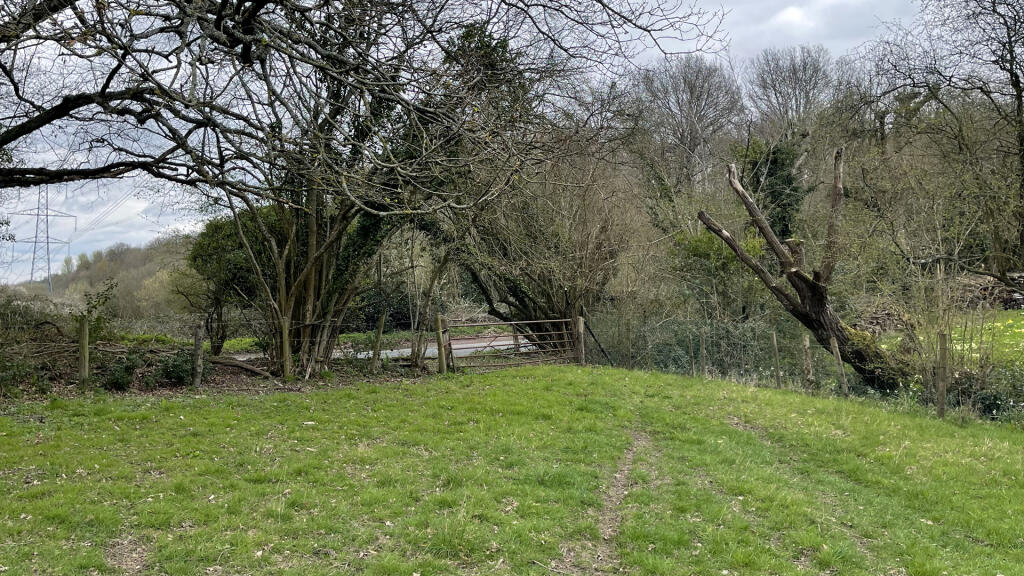 Road frontage and direct gated access.