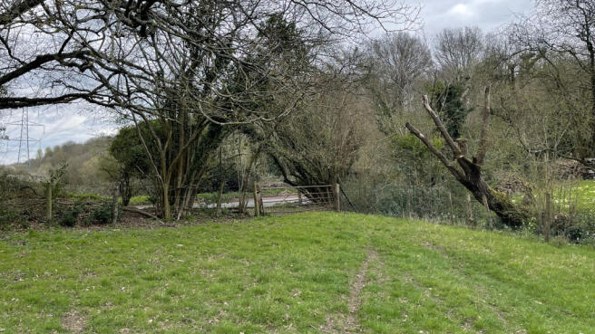 Road frontage and direct gated access.