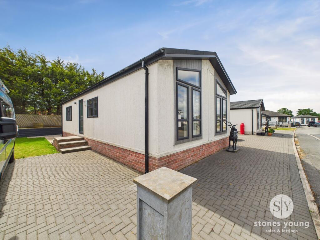 Main image of property: 2 Le Dale Mobile Holiday Park, Longsight Road, Clayton Le Dale, Blackburn BB1 9EX