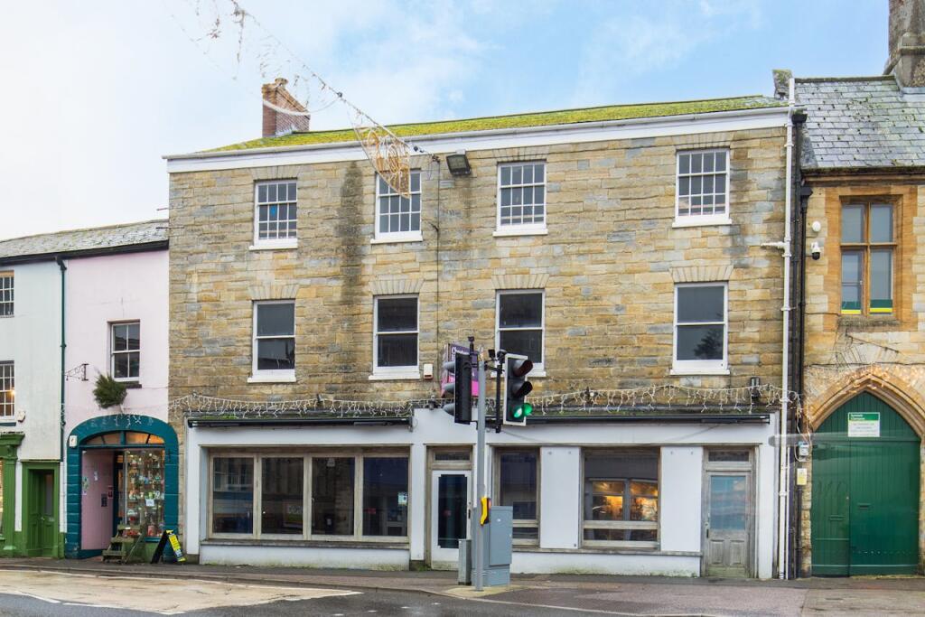 Main image of property: Former shop and Restaurant, Trinity Square, Axminster, EX13 5AN