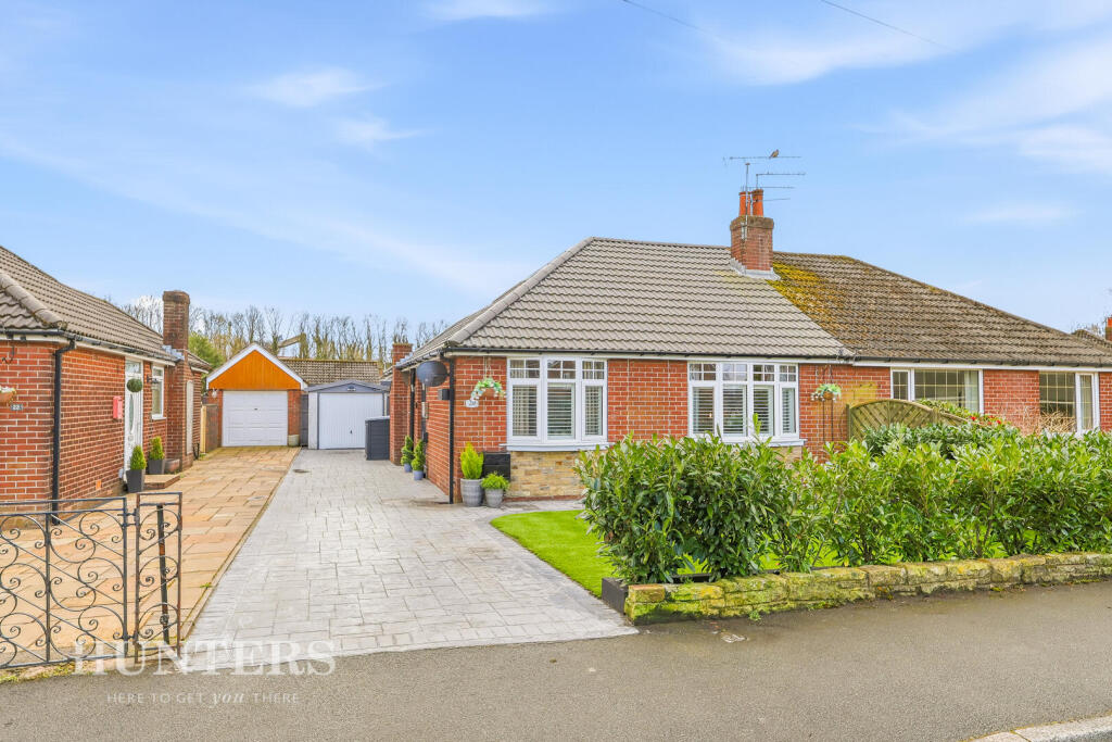 Main image of property: Ladyhouse Lane, Milnrow, OL16 4EQ