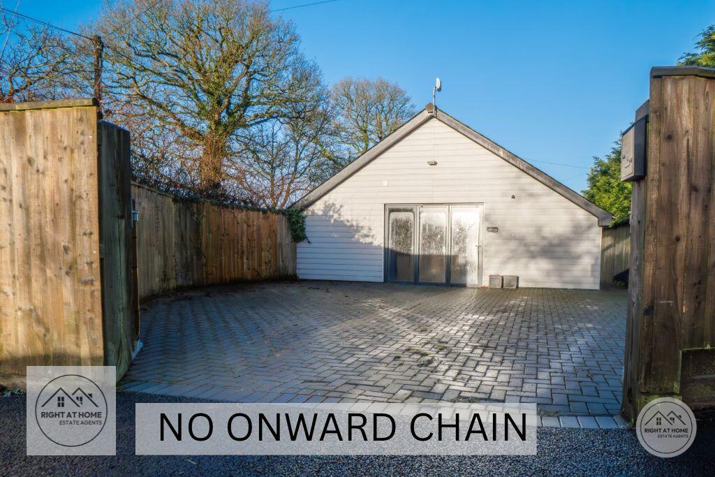 Main image of property: Huxham Lodge, Church Hill, Pinhoe, Exeter EX4 9JJ