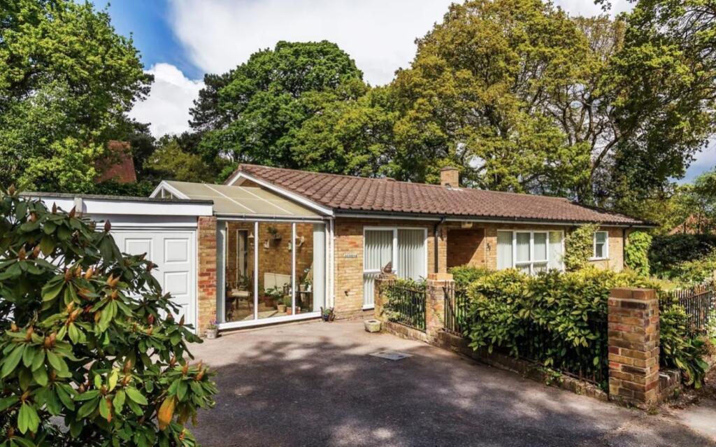 Main image of property: Hare Hill Close, GU22 8UH