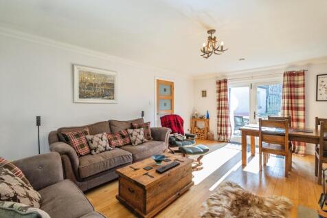 Lounge opening up to rear french doors.jpeg