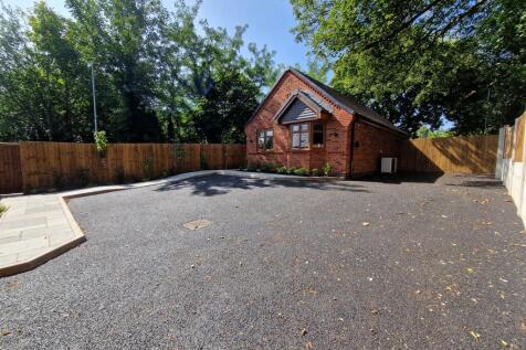 Front of Property with Parking