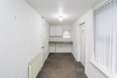 SUN ROOM/UTILITY ROOM