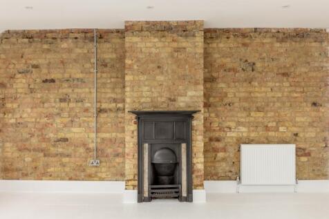BARE BRICK FEATURE WALL