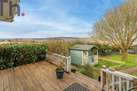 Summer House with Raised Decking Area with Open Co