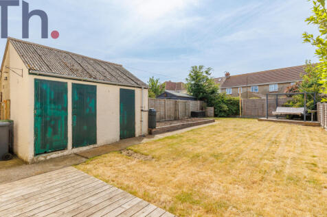 Rear Garden with Outbuildings