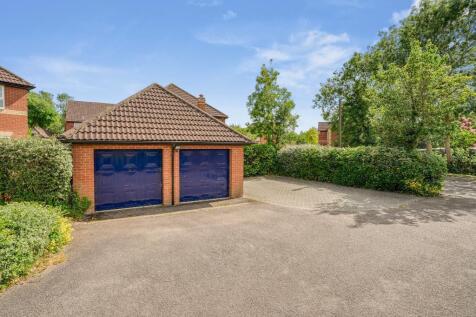 Double garage and driveway