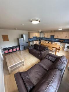 PHOTO 1 OPEN PLAN LIVING ROOM KITCHEN.jpg