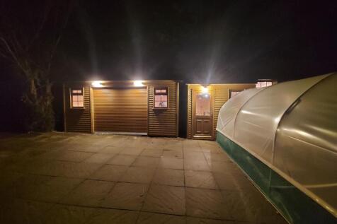 Outbuilding and Car parking 