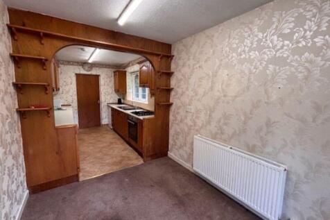 Dining Area to Kitchen