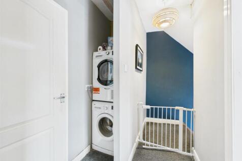 First Floor Landing/ Utility Area