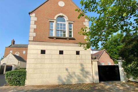 Double gates to covered carport
