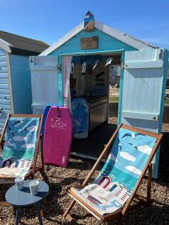 FRONT OF HUT CLOS...