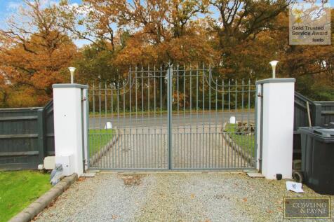 GATED PARKING FOR TWO CARS