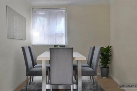 Room 2 dining room staged.jpeg