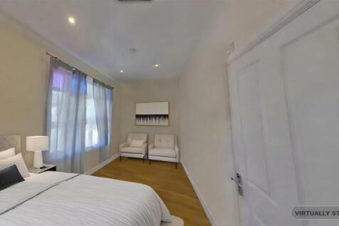 First floor bedroom 6 staged.jpeg