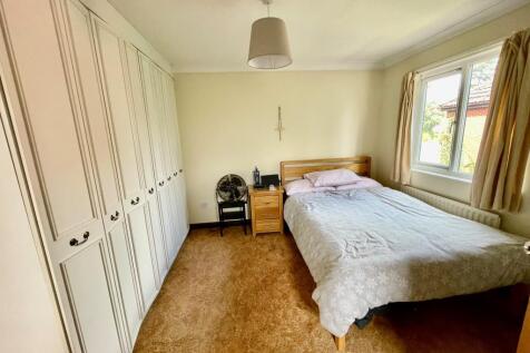 Master bedroom with fitted wardrobes