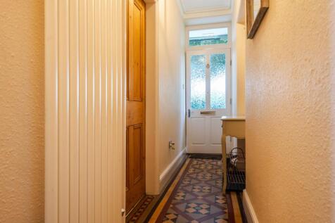 Entrance hall with original tiling