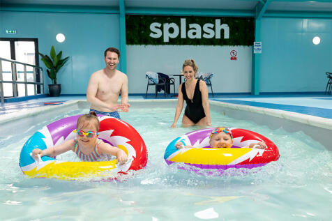 Family In Pool