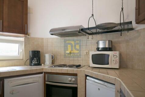 Muo_Stone_House