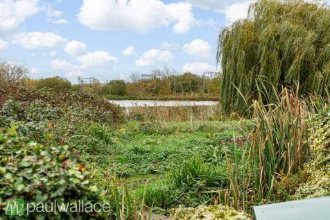 Backing onto Admirals Lake
