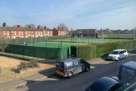OVERLOOKING TENNIS