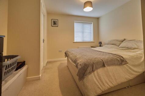 BEDROOM ONE TO FRONT