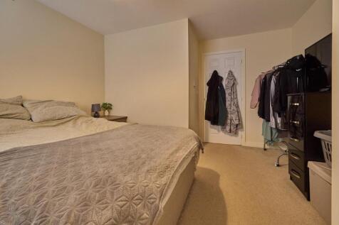 BEDROOM ONE TO FRONT
