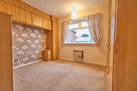 BEDROOM ONE TO REAR