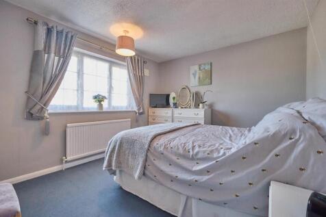 BEDROOM ONE TO FRONT