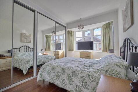 BEDROOM ONE TO FRONT