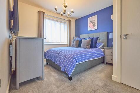 BEDROOM ONE TO REAR