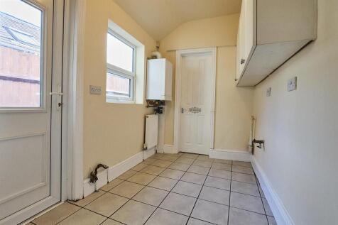 UTILITY ROOM TO THE REAR