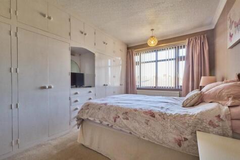 FRONT BEDROOM ONE
