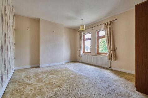BEDROOM ONE TO FRONT