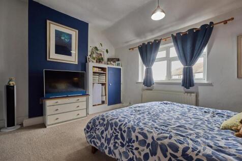 BEDROOM ONE TO FRONT