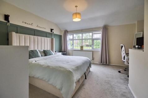 BEDROOM ONE TO FRONT