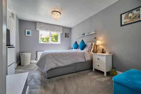 BEDROOM ONE TO REAR