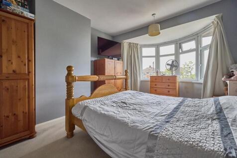 BEDROOM ONE TO FRONT