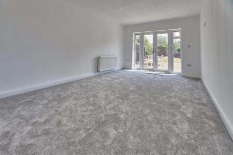 THROUGH LOUNGE/DINING ROOM