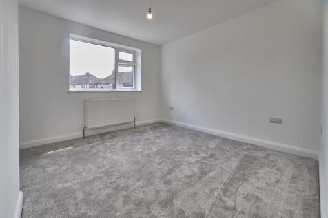 BEDROOM ONE TO REAR